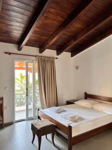 Postel nebo postele na pokoji v ubytování Margarita Guesthouse