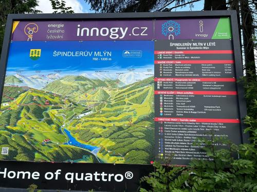 a sign for the hue of guilin mountains at Cosy and Modern Apartment Labska Spindl in Krausovy Boudy