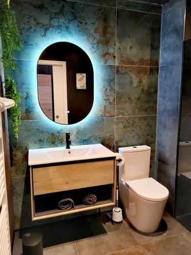 Ένα μπάνιο στο Chambre confort bien située