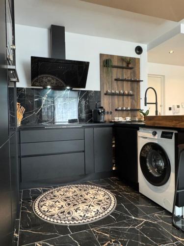 Kuchyň nebo kuchyňský kout v ubytování Garden Suite Toulouse
