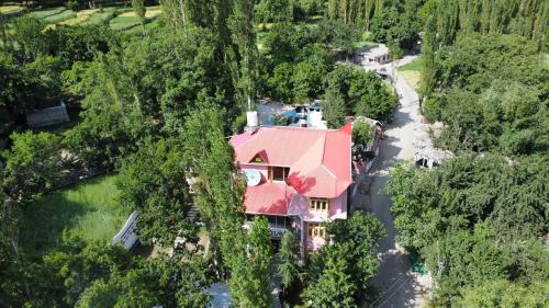 an aerial view of a house with a red roof at North Palace Khaplu in Khaplu