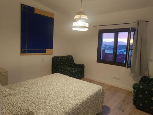 Ένα ή περισσότερα κρεβάτια σε δωμάτιο στο Ático relax con gran terraza y vistas a la Costa Brava