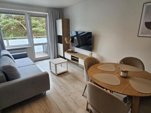 Apartament z widokiem na las