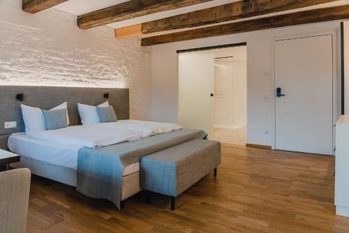 Cama o camas de una habitación en Aktiv Hotel am Inn