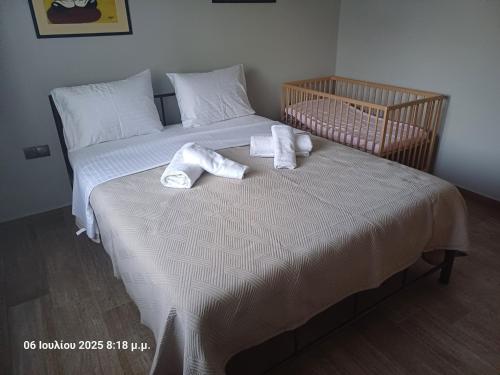 Postel nebo postele na pokoji v ubytování Delou-M 27 01 Luxury Apartment by Igoumenitsa