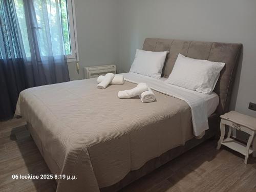 Postel nebo postele na pokoji v ubytování Delou-M 27 01 Luxury Apartment by Igoumenitsa