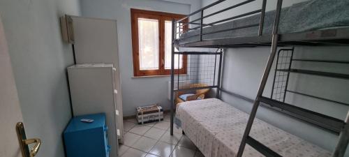 En eller flere senge i et værelse på Spending seaside villa in Cirella, Italy