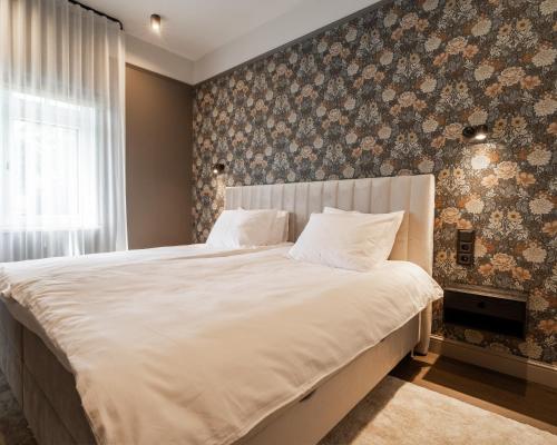 Ένα ή περισσότερα κρεβάτια σε δωμάτιο στο Villa Maramaa