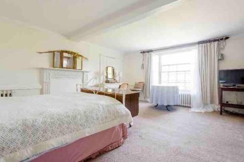 Ένα ή περισσότερα κρεβάτια σε δωμάτιο στο Rye private self contained sleeps 2 - 5