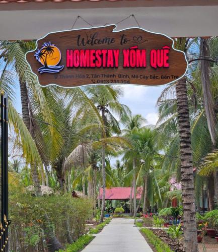Homestay Xóm Quêに飾ってある許可証、賞状、看板またはその他の書類