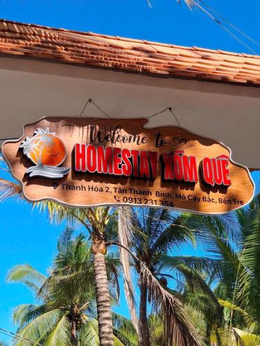 Homestay Xóm Quêに飾ってある許可証、賞状、看板またはその他の書類