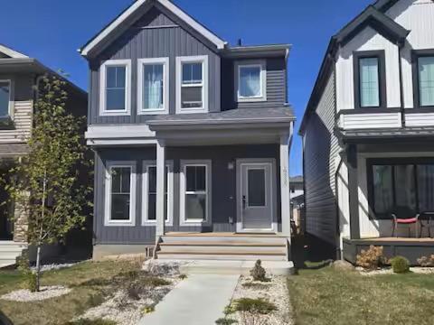 a large house with a gray at Bedroom in Upland B in Edmonton
