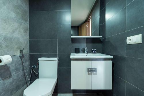 Un baño de High-End Apartment, Serenity & Stunning Pool