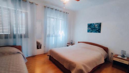Postel nebo postele na pokoji v ubytování Apartments Josef