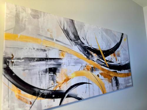 a close up of a painting on a wall at Hotel-Style, No Host, Professionally Managed ID267 in Jersey City