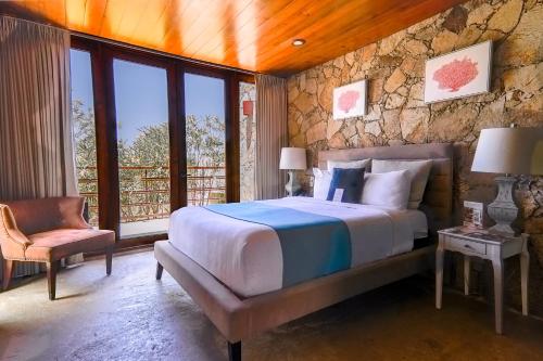 Postel nebo postele na pokoji v ubytování Maglen Resort