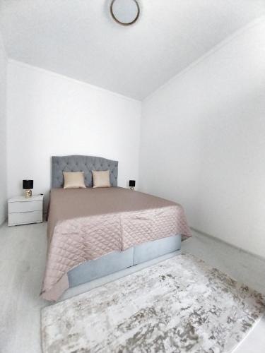 Postel nebo postele na pokoji v ubytování Szalamandra Residence