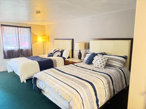 Postel nebo postele na pokoji v ubytování St. Mary’s Motel