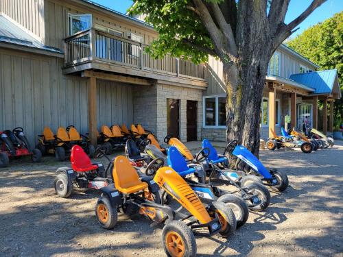 a group of motor scooters parked in front of a building at Tobermory Village Cabins in Tobermory