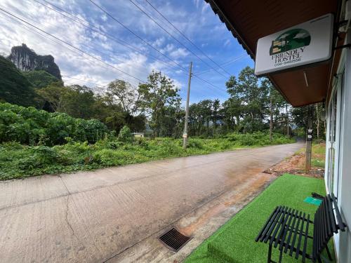 a view of a road from the window of a bus at Friendlyhostel in Khao Sok
