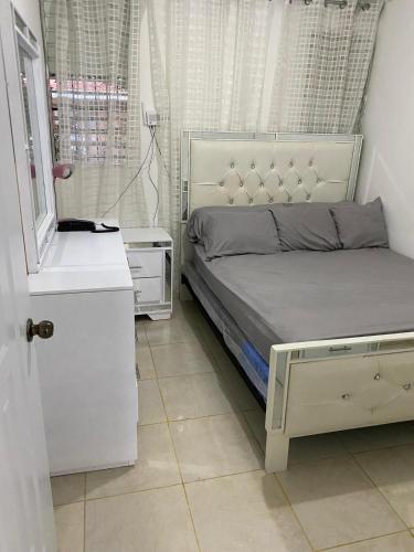 Postel nebo postele na pokoji v ubytování Apartamento hermoso en el centro de la ciudad de moca