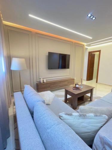 TV o dispositivi per l'intrattenimento presso Appartement premium pour vivre la CAN 2025 à fond