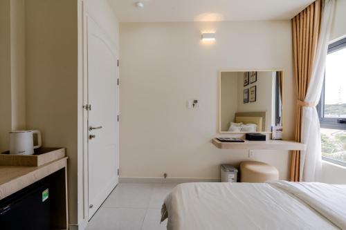 Postel nebo postele na pokoji v ubytování Island Sunset Hotel - Đảo Phú Quý