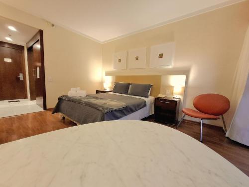 Postel nebo postele na pokoji v ubytování Paulista Premium Flat II