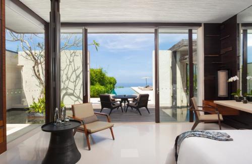 a living room with a view of the ocean at Alila Villas Uluwatu in Uluwatu