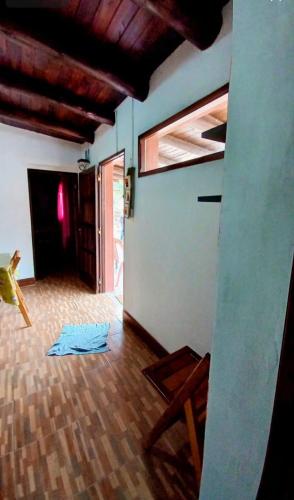 an empty room with a room with a floor and a door at Cabañas virgen de la candelaria in Maimará
