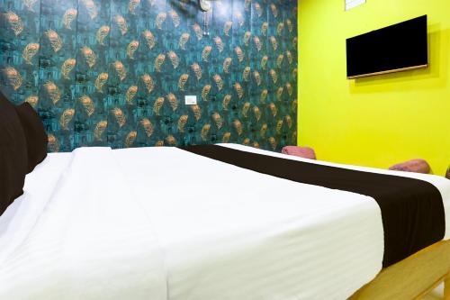 Μια τηλεόραση ή/και κέντρο ψυχαγωγίας στο Hotel O A K Residency