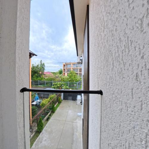 a view from the balcony of a building at Premium apartment in Ureki