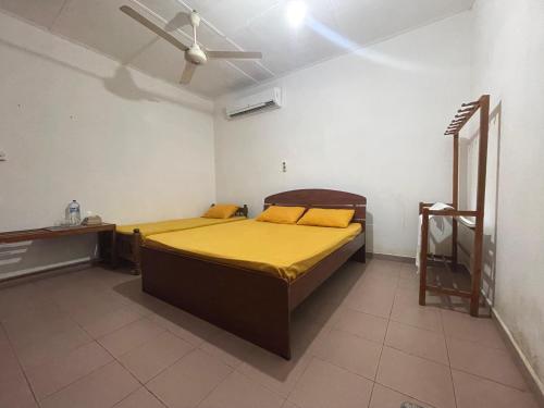 Ένα ή περισσότερα κρεβάτια σε δωμάτιο στο Nature Paradise