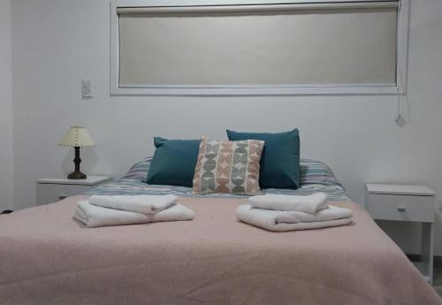 Cama o camas de una habitación en Casitas de Ale en Sierra Ventana