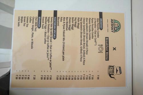 a menu for a restaurant in a box at Akshay BnB & HomeStay in Lucknow