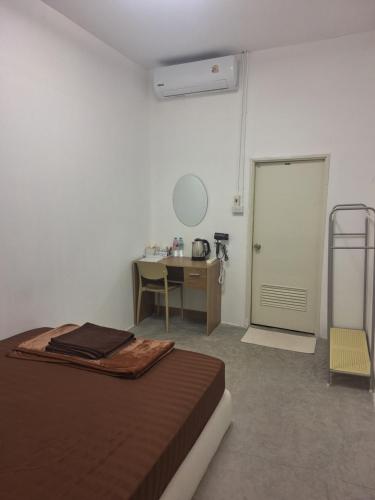 Postel nebo postele na pokoji v ubytování Phangan backpacker