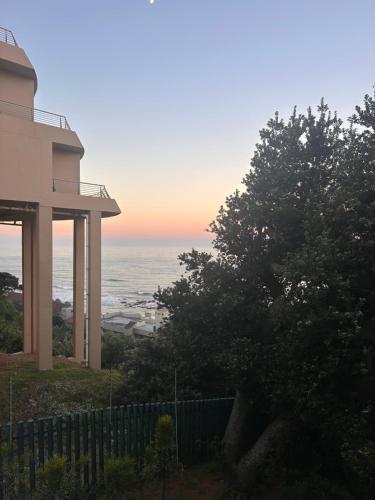 a view of the ocean from a house at Unit 124 Camarque , Umdloti in Umdloti