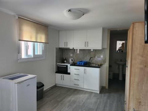 Venias Roomsにあるキッチンまたは簡易キッチン