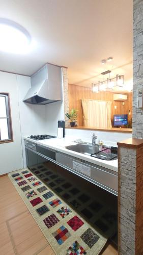a kitchen with a sink and a counter top at 22minutes by car to Nagoya Station 2parking 