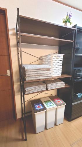 a room with three bins on a shelf at 22minutes by car to Nagoya Station 2parking 