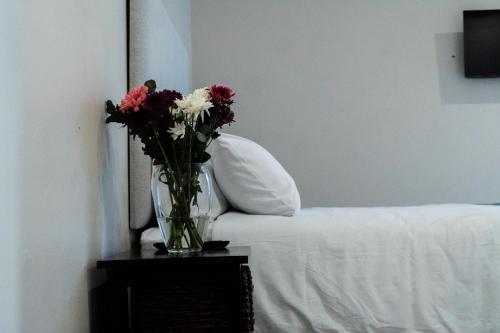 Postel nebo postele na pokoji v ubytování Megs Guesthouse
