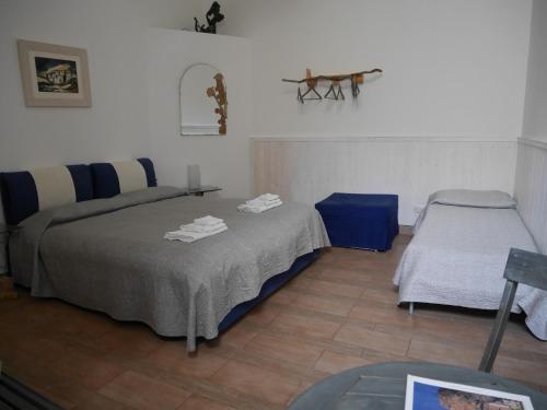 A bed or beds in a room at 4 Camere A Trani