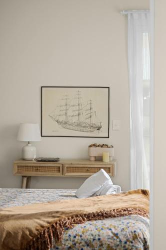 Ein Bett oder Betten in einem Zimmer der Unterkunft Cockatoo EcoHouse