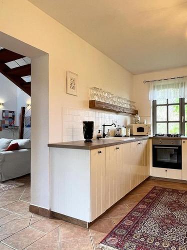 Η κουζίνα ή μικρή κουζίνα στο 44 George House - Pool, Jacuzzi, Sauna, View