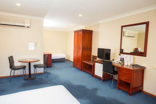 Nightcap at Federal Hotel Toowoombaにあるテレビまたはエンターテインメントセンター