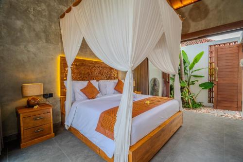Ένα ή περισσότερα κρεβάτια σε δωμάτιο στο Katamaya Villa