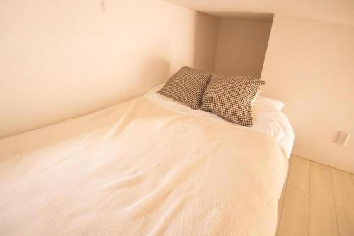 Postel nebo postele na pokoji v ubytování SCS202, 20 mins to Skytree, 30 mins to Ueno and Ginza