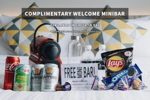 a group of products sitting on top of a bed at Harbour Ville Hotel in Singapore