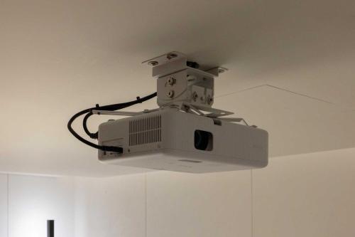 a light hanging from the ceiling in a room at Ondo Hotel and Spa Jongno by Aank in Seoul