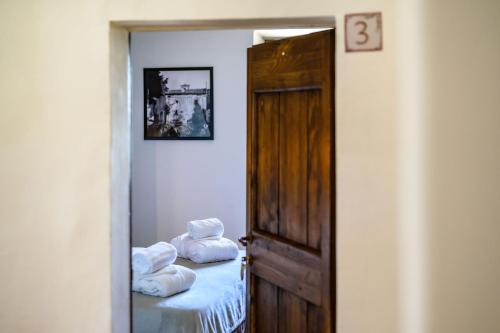 Cama o camas de una habitación en Convento dei Cappuccini